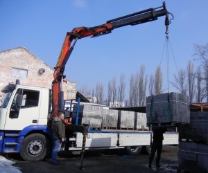Перевезти бетонные кольца в Алматы